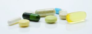 Variety of pills on a table.