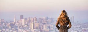 Woman overlooking the city.
