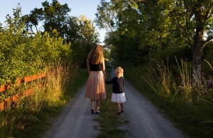 Children walking down gravel road